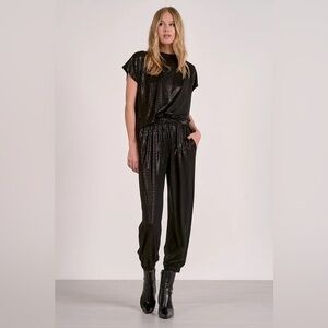 Elan jumpsuit that is beyond comfortable and fabulous looking. Black Sz S